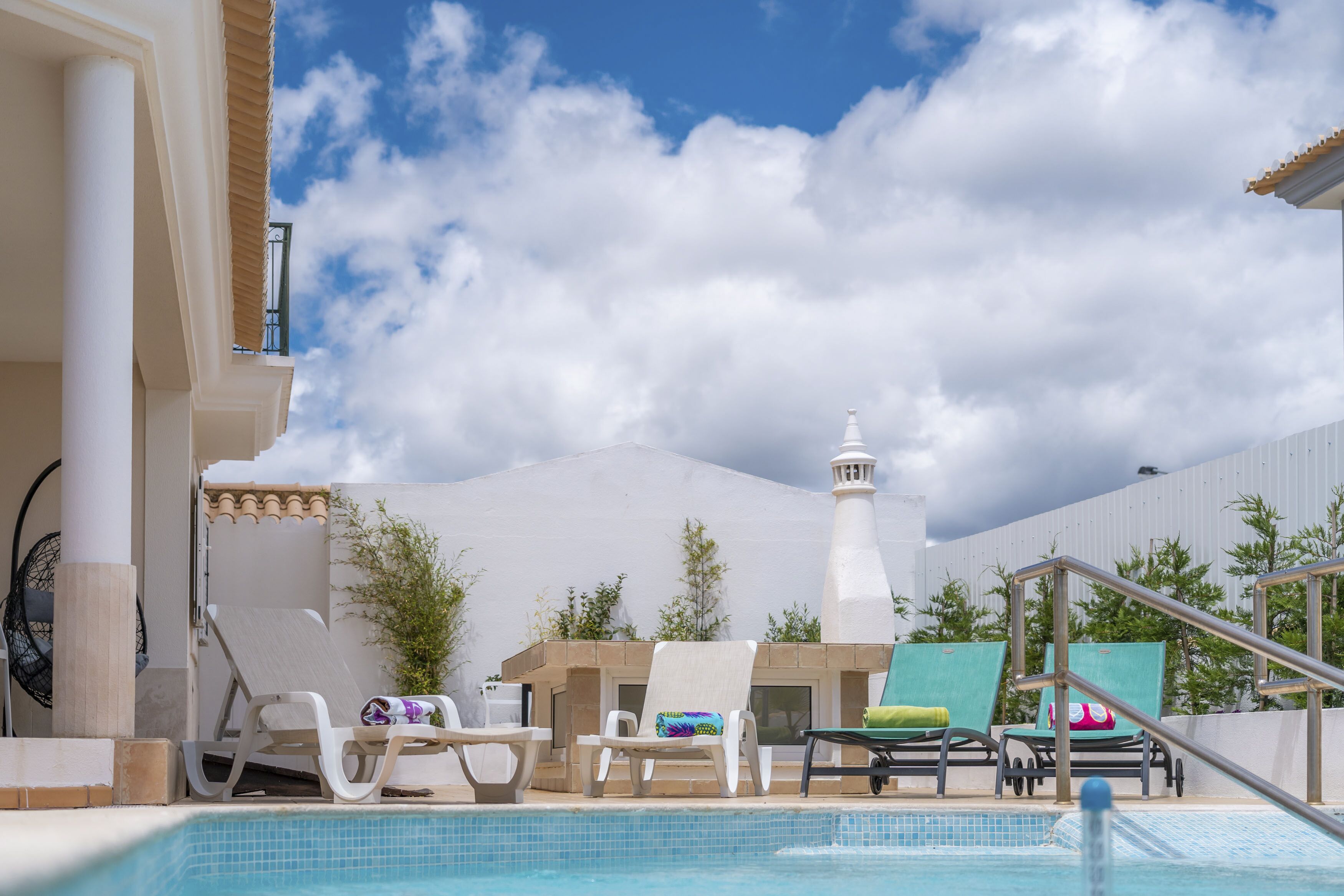 Outdoor pool, a heated pool, pool umbrellas, sun loungers