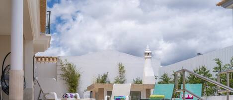 Outdoor pool, a heated pool, pool umbrellas, sun loungers