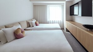 A hotel room with two beds, a TV mounted on the wall, and a large window with curtains. - OMO3 Tokyo Akasaka by Hoshino Resorts (Tokyo)