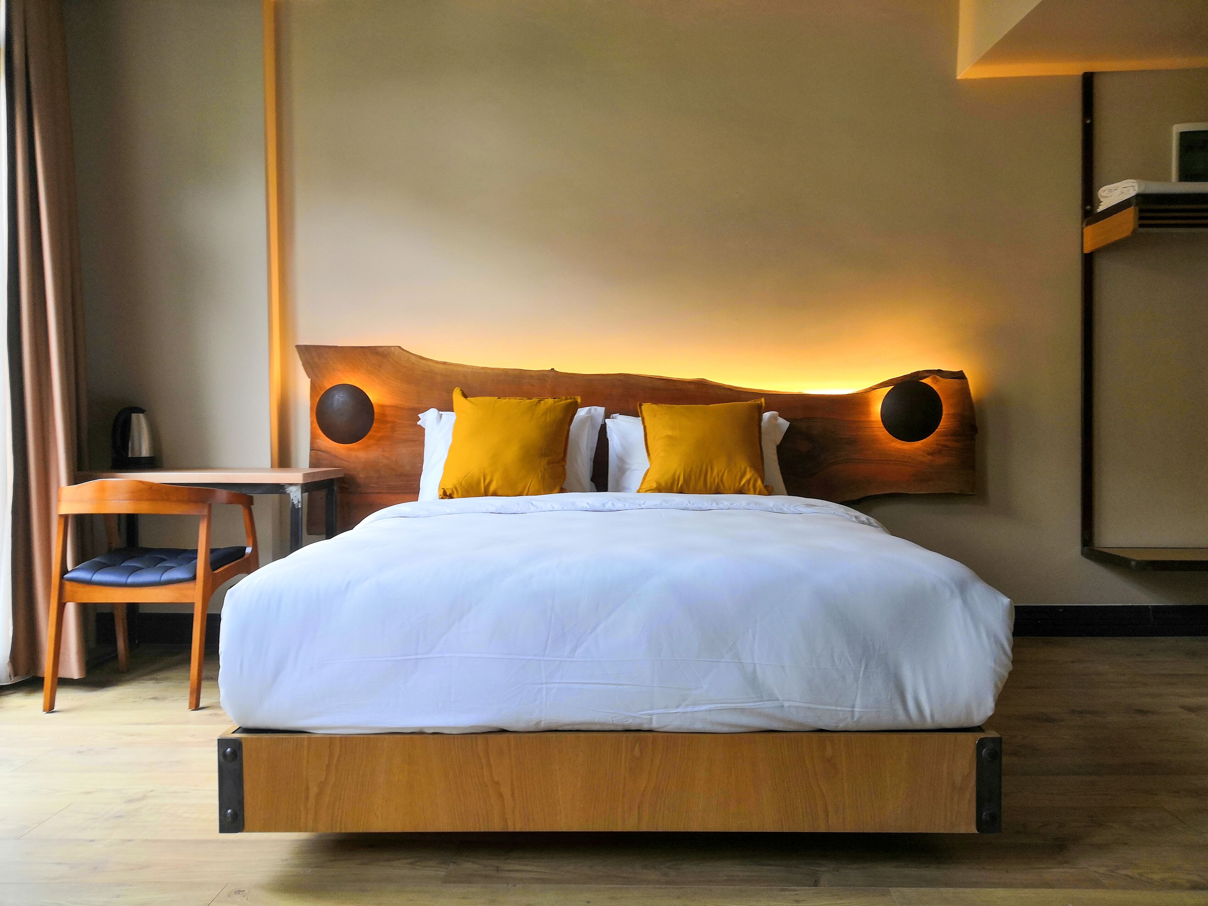 deluxe double room | minibar, desk, laptop workspace, blackout curtains