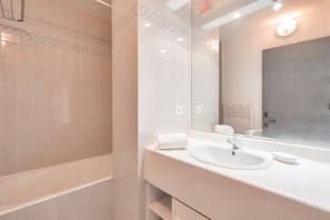 Bathtub, hair dryer