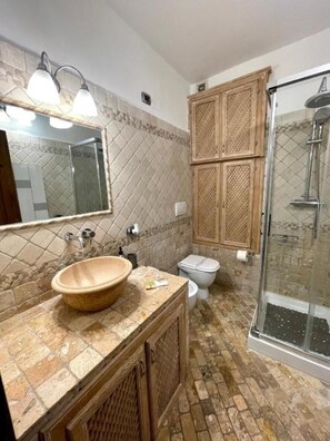 Shower, free toiletries, hair dryer, bathrobes