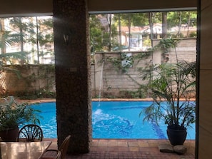 Outdoor pool - Stay.Plus West Heights Studio Apartment (Nairobi)