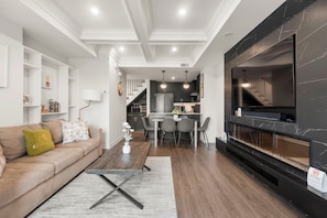 Premium Townhome, 2 Bedrooms, Terrace, Lakeside | Living area | 60-inch flat-screen TV with digital channels, fireplace, Netflix - Etobicoke 2 Bedroom Townhouse Close to Waterfront (Toronto)