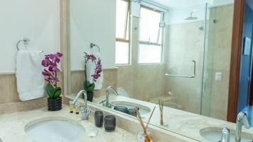 Shower, hair dryer, towels, soap
