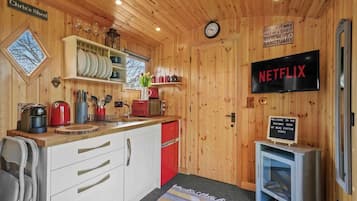Fridge, microwave, stovetop, coffee/tea maker