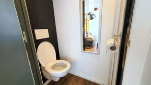 Shower, eco-friendly toiletries, hair dryer, towels