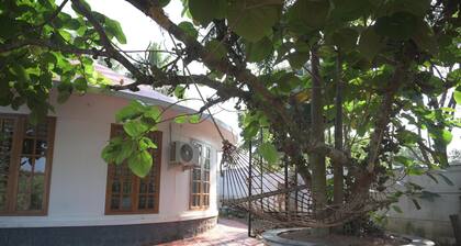 Charming roundhouse villa with garden view