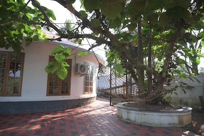 Charming roundhouse villa with garden view