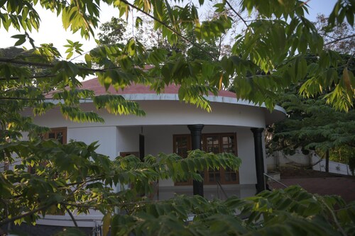 Charming roundhouse villa with garden view