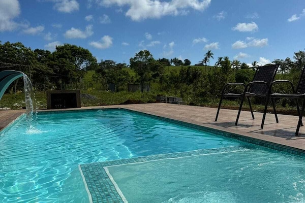Outdoor pool, pool umbrellas, sun loungers