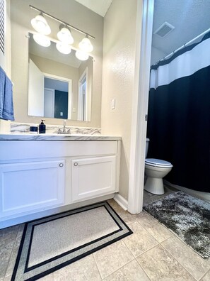 Combined shower/bathtub