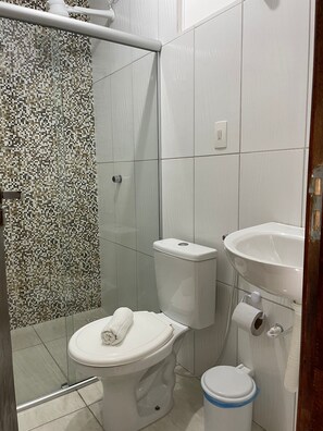 Shower, towels, soap, toilet paper