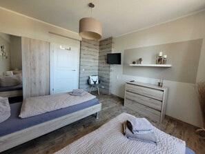 4 bedrooms, travel cot, WiFi, bed sheets