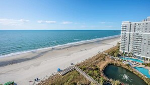 A beachfront hotel with a pool, beach access, and ocean view. - New High Floor, Direct Sea Watch, King Bed, Decor! (Myrtle Beach)