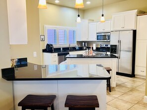 Fridge, microwave, oven, stovetop - 🎄SALE!🎄Book 1 week & get 1 FREE NIGHT! BEACH HOUSE HEATED POOL 7BR 4BA for 23ppl (Panama City Beach)