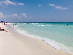 On the beach, sun loungers