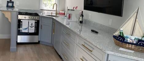 Microwave, oven, stovetop, coffee/tea maker