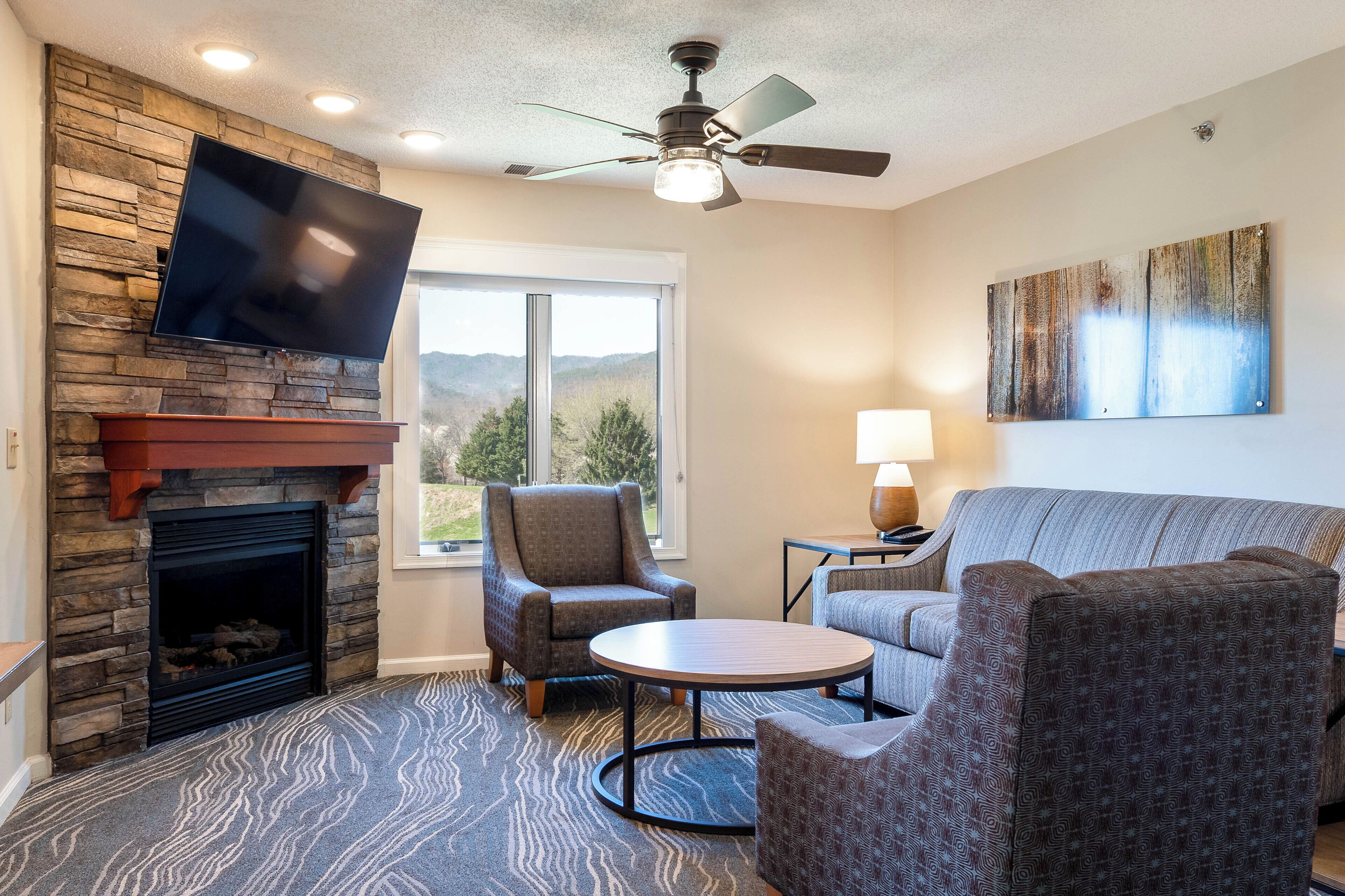 Woodstone One Bedroom Deluxe Condo with Spa Tub/Full Kitchen | Living area | 37-inch flat-screen TV with cable channels, TV, ping pong