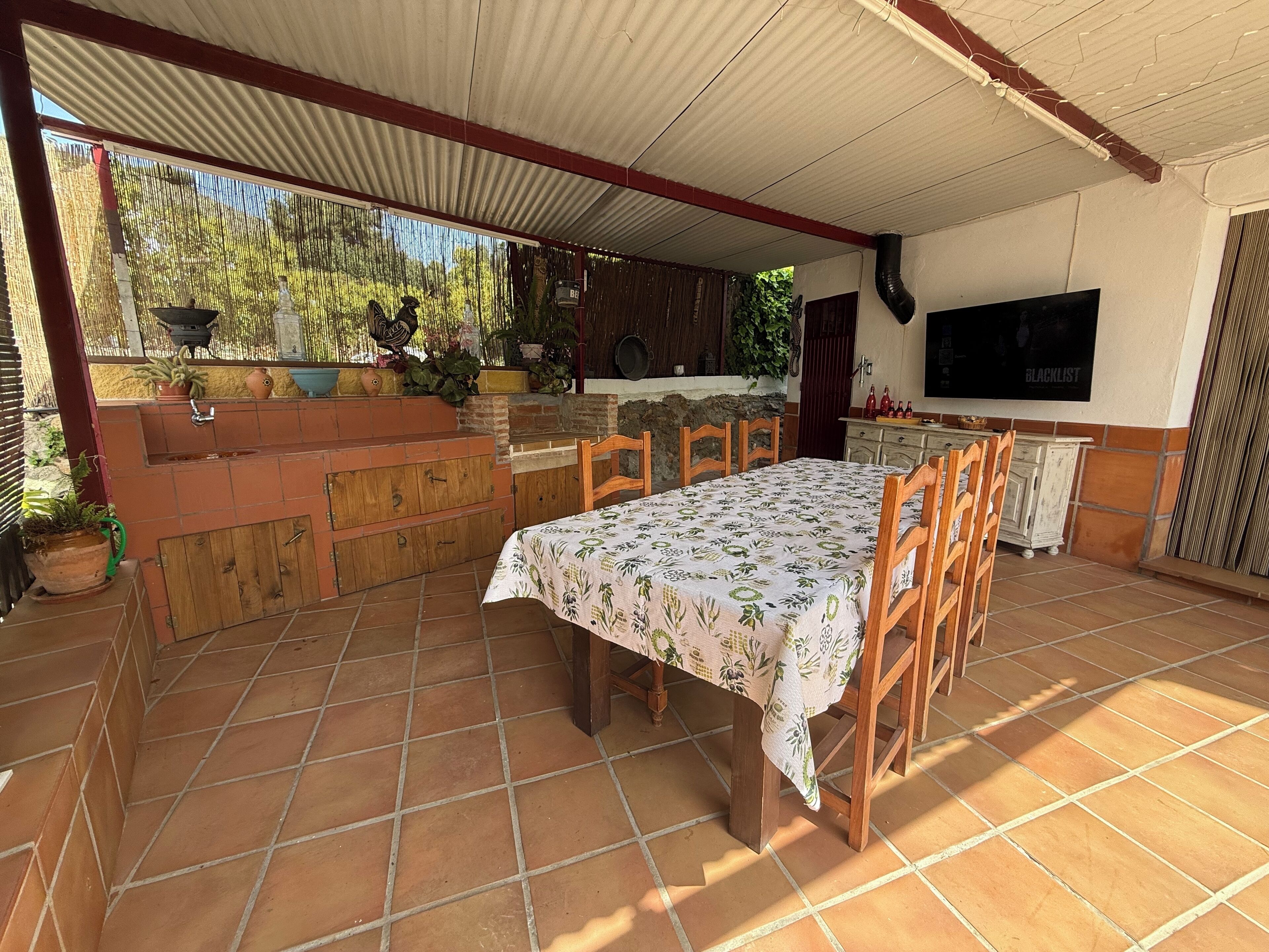 Outdoor Kitchen, 55” HD TV and dining.