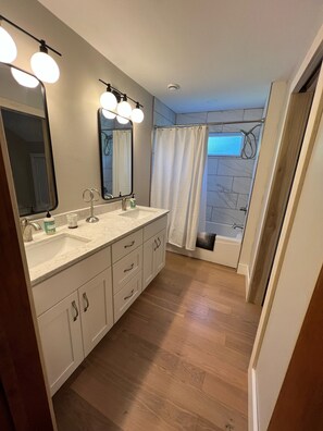 Combined shower/tub, hair dryer, towels, soap
