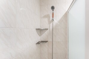 Shower, hair dryer, towels, soap