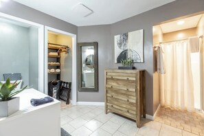 Shower, hair dryer, towels, toilet paper