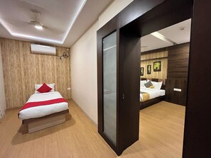 Habitación ejecutiva, 2 camas individuales | Caja fuerte, wifi gratis, ropa de cama