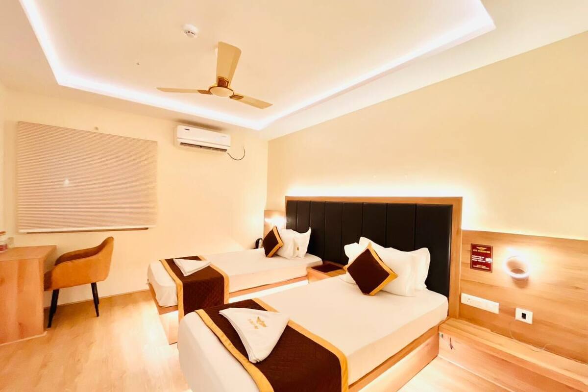 Chambre Exécutive, 2 lits une place | Coffres-forts dans les chambres, Wi-Fi gratuit, draps fournis