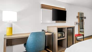 Premium bedding, memory-foam beds, laptop workspace, blackout curtains