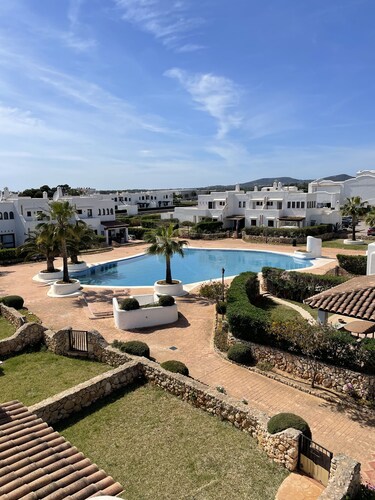 Townhouse, surrounded by gardens and swimming pools