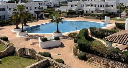 Townhouse, surrounded by gardens and swimming pools