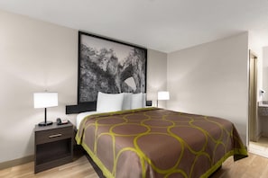 Chambre, 1 trĂšs grand lit, non-fumeur | Bureau, fer et planche Ă repasser, accĂšs au Wi-Fi (inclus)