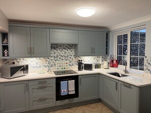 Fridge, microwave, freezer, dining tables