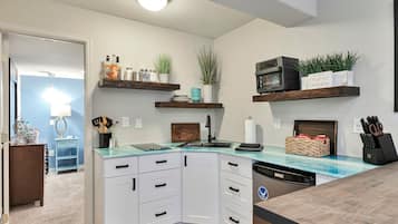 Fridge, microwave, stovetop, coffee/tea maker
