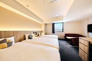 Triple Room, Non Smoking | In-room safe, desk, laptop workspace, blackout drapes