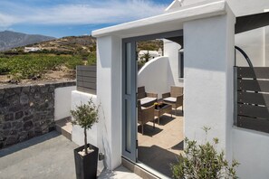 Basic Double Room | Terrace/patio - Potamida Suites (Santorini)