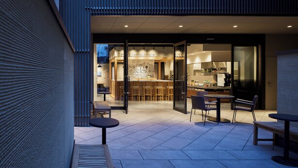 An outdoor patio area with a bar and seating. - OMO5 Kyoto Sanjo by Hoshino Resorts (Kyoto)