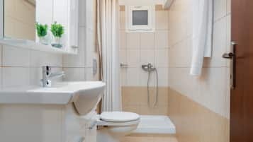 Family Room, 2 Bedrooms | Bathroom | Shower, rainfall showerhead, hair dryer, towels