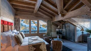 Suite Supérieure | Minibar, coffres-forts dans les chambres, rideaux occultants