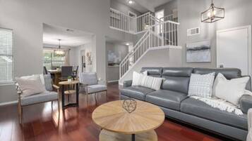 Smart TV, fireplace, books, offices