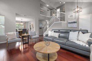 Smart TV, fireplace, books, offices
