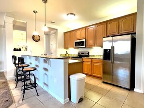 Microwave, stovetop, dishwasher, cookware/dishes/utensils
