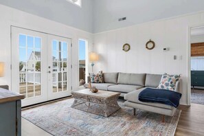 TV, offices - Isle Of A Time by Brunswick Vacation Rentals: Canal Front with Boat Slip (Ocean Isle Beach)