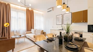 Deluxe Apartment | Living area | LCD TV