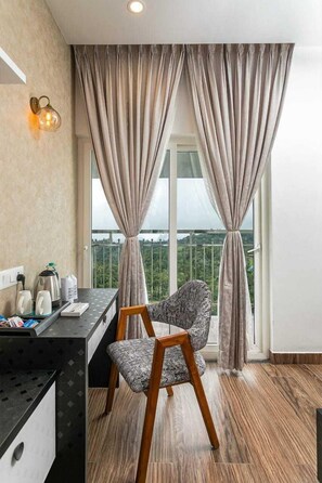 43-inch LED TV with satellite channels, TV - Ramee Wolkenburg Resort and Spa Munnar (Devikolam)