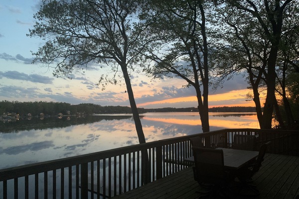 Wake up to golden sunrises and sparkling lake views from your deck-pure Michigan