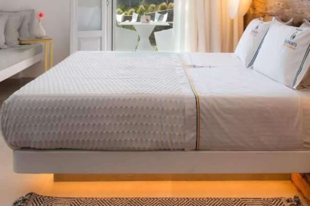 Premium bedding, memory foam beds, minibar, desk