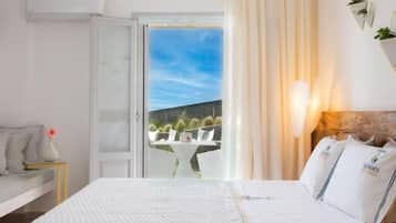 Premium bedding, memory-foam beds, minibar, desk