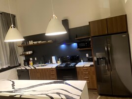 Apartment | Private kitchen | Full-size fridge, microwave, oven, stovetop